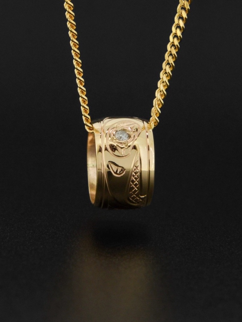 Solid 14K gold northwest native totem bead with diamond